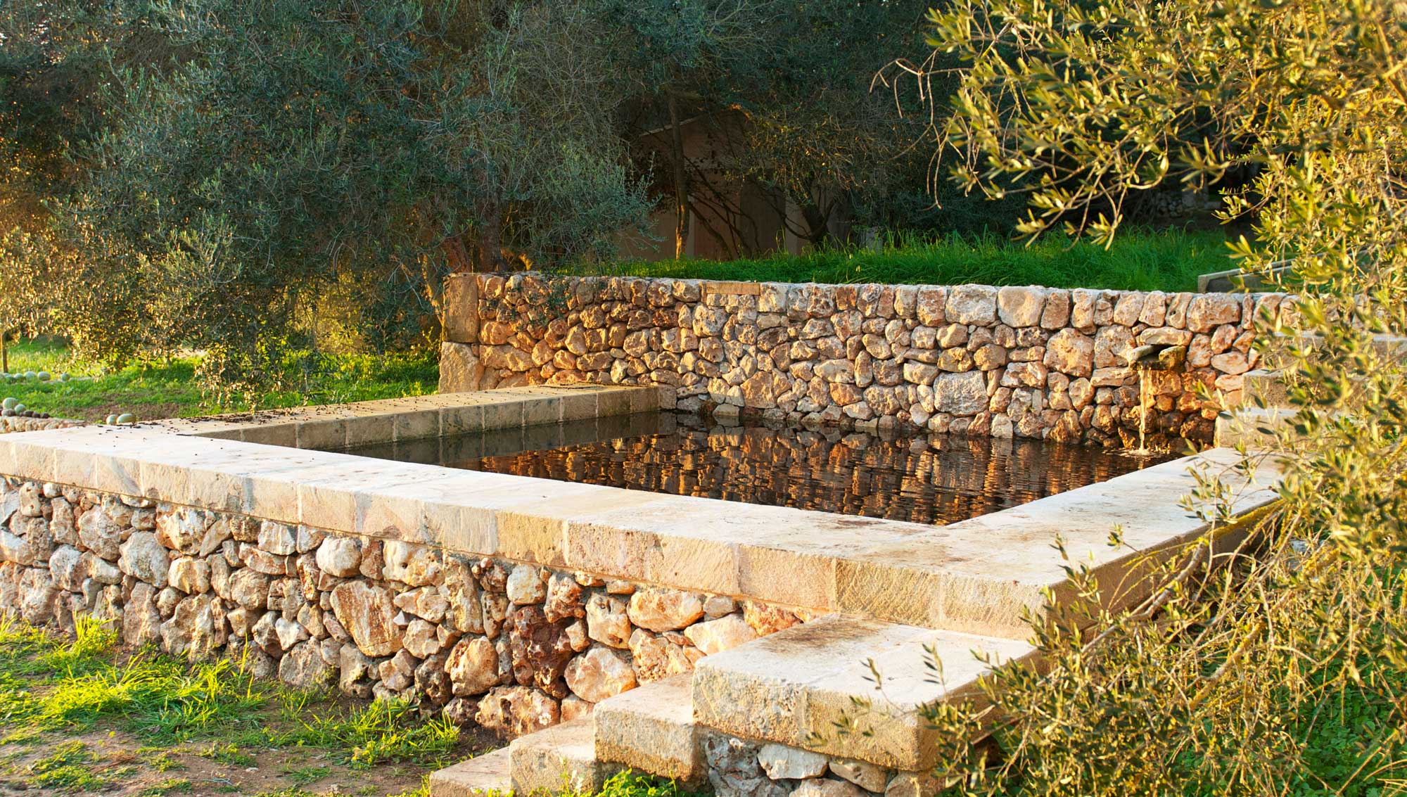 Stone pool in Mallorcan Garden - James Aldridge Landscape and Garden Design